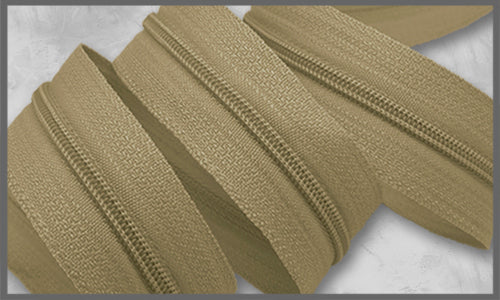 Reissverschluss beige