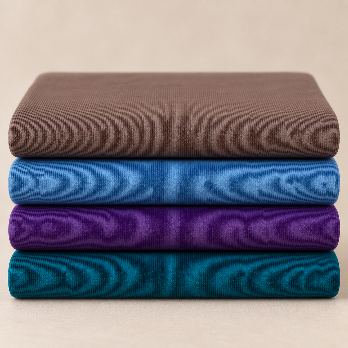 Nanni Flachstrickbündchen in Nussbraun, Rauchblau, Petrol und Violett