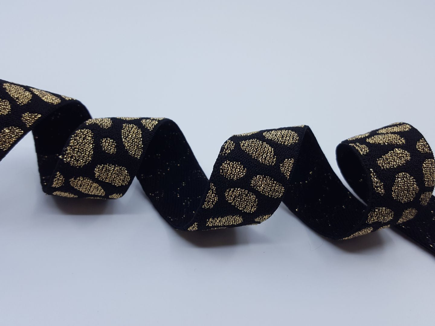 Elastisches Metall Gummiband Leo gold/schwarz