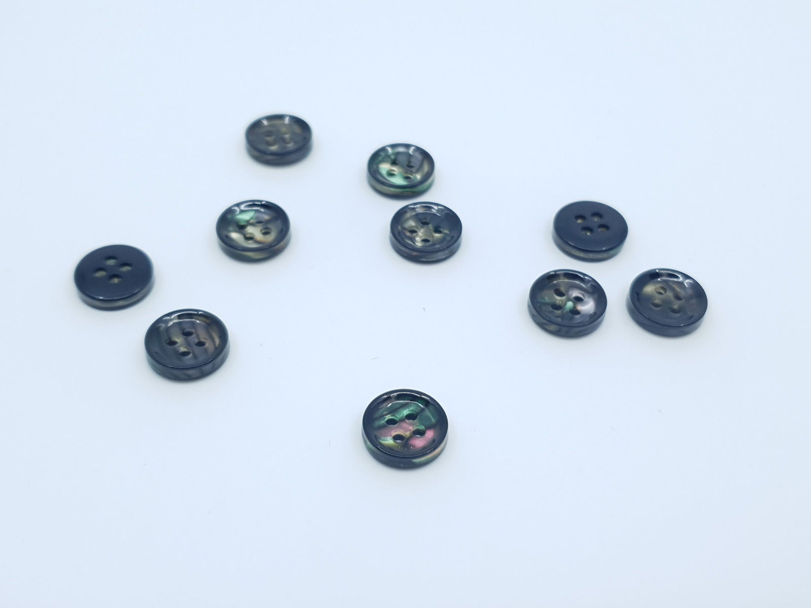 Kunstoffknöpfe 12mm schwarz/bunt