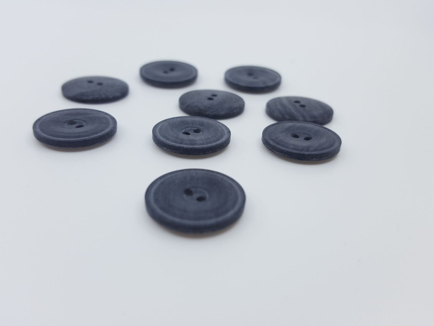 Kunststoffknöpfe mit Rand dunkelblau melange 16mm
