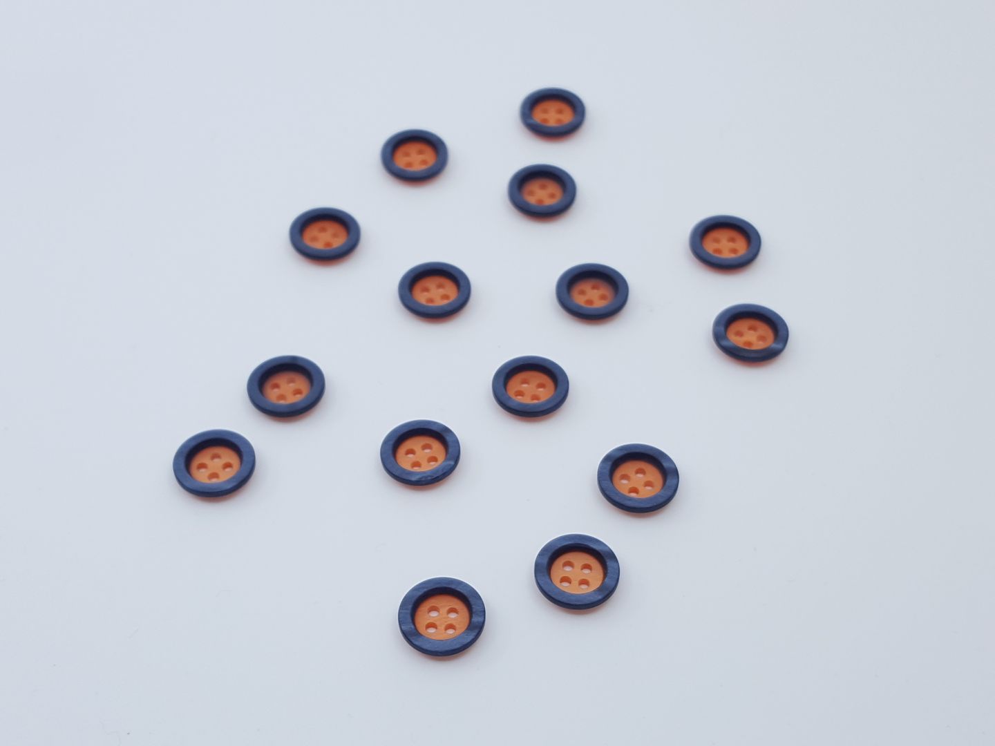 Kunststoffknöpfe mit Rand orange/dunkelblau 11mm