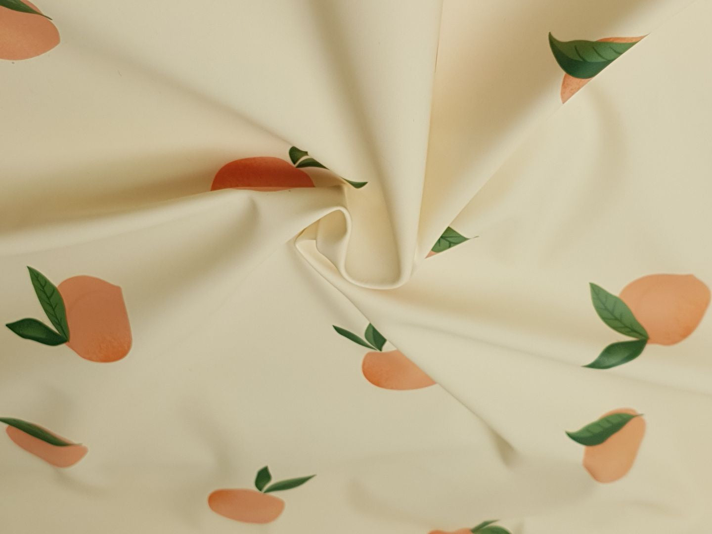 Raincoat peach creme/apricot