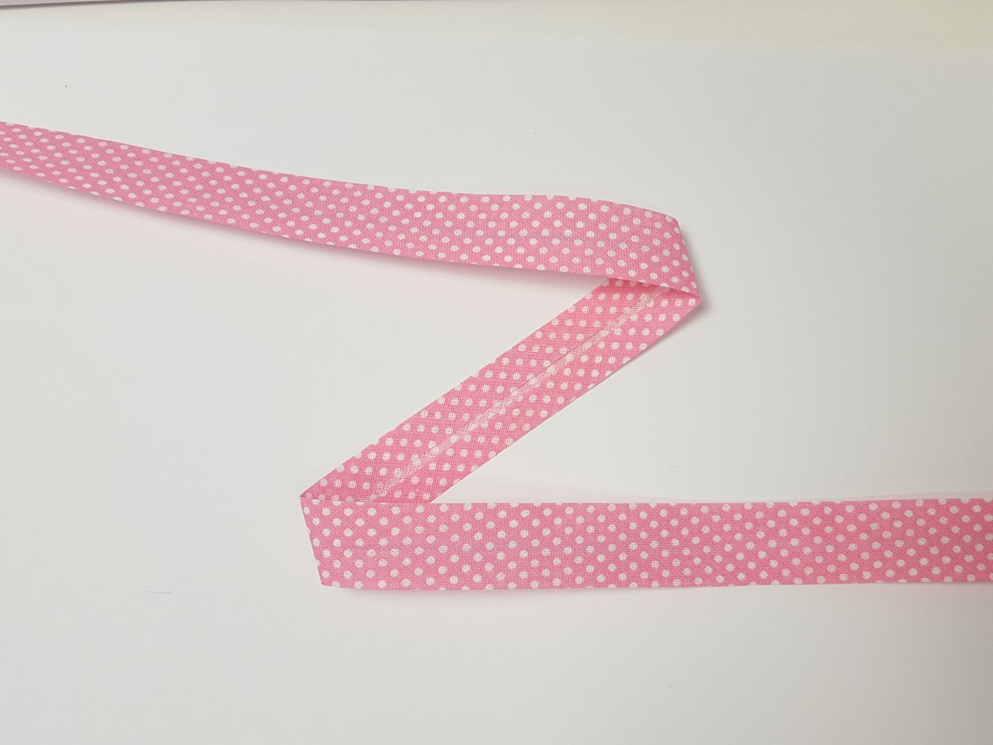 Schrägband Dotties rosa/weiss