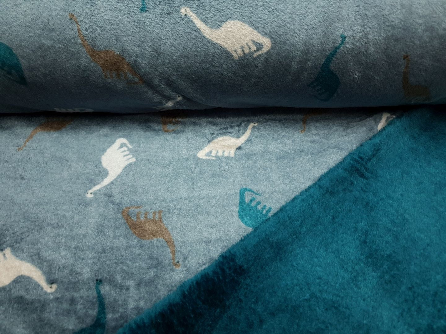 Wellnessfleece Dinos stahlblau/petrol/offwhite/braun