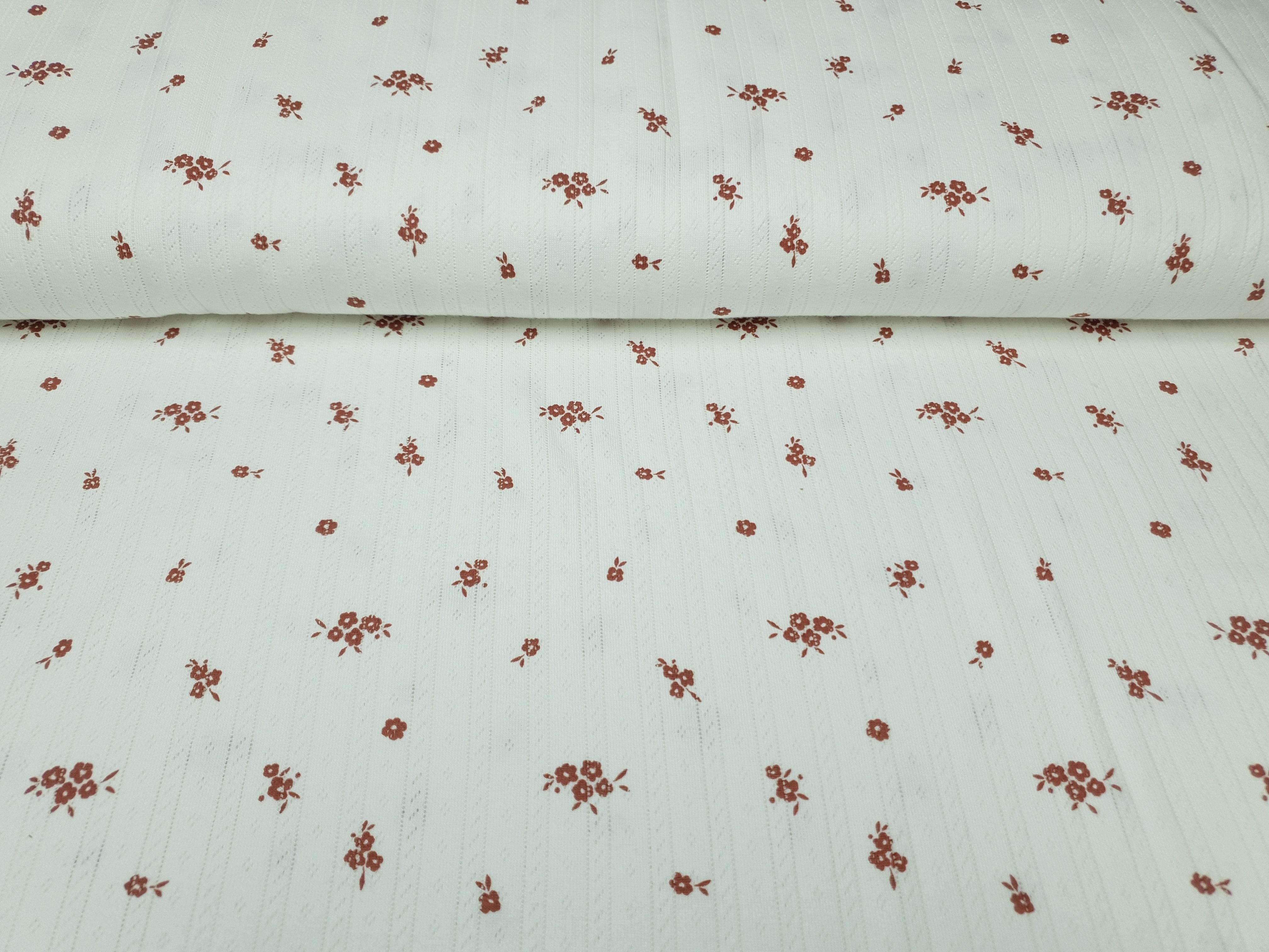 Ajour Blümchen offwhite/rostbraun