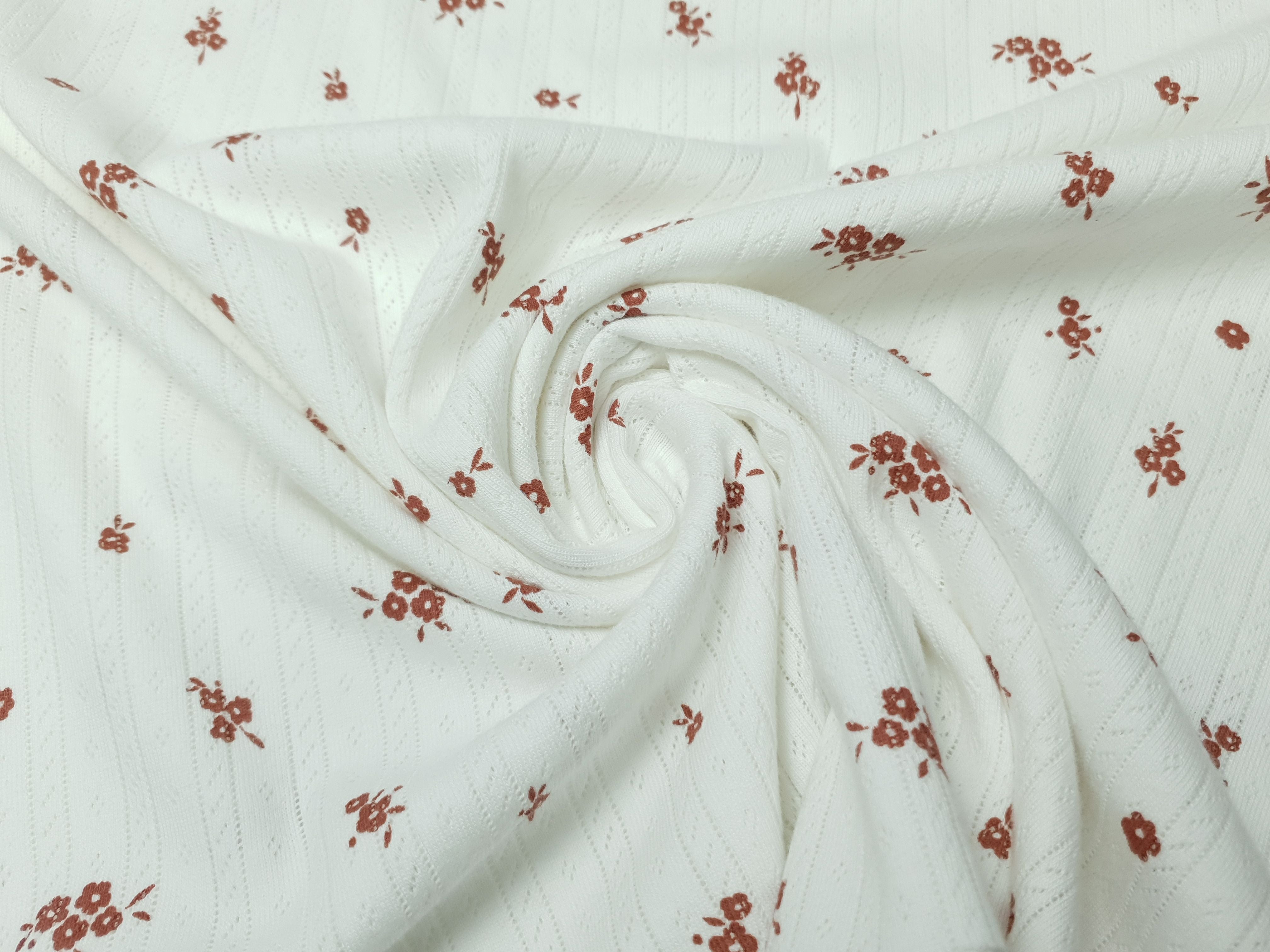 Ajour Blümchen offwhite/rostbraun