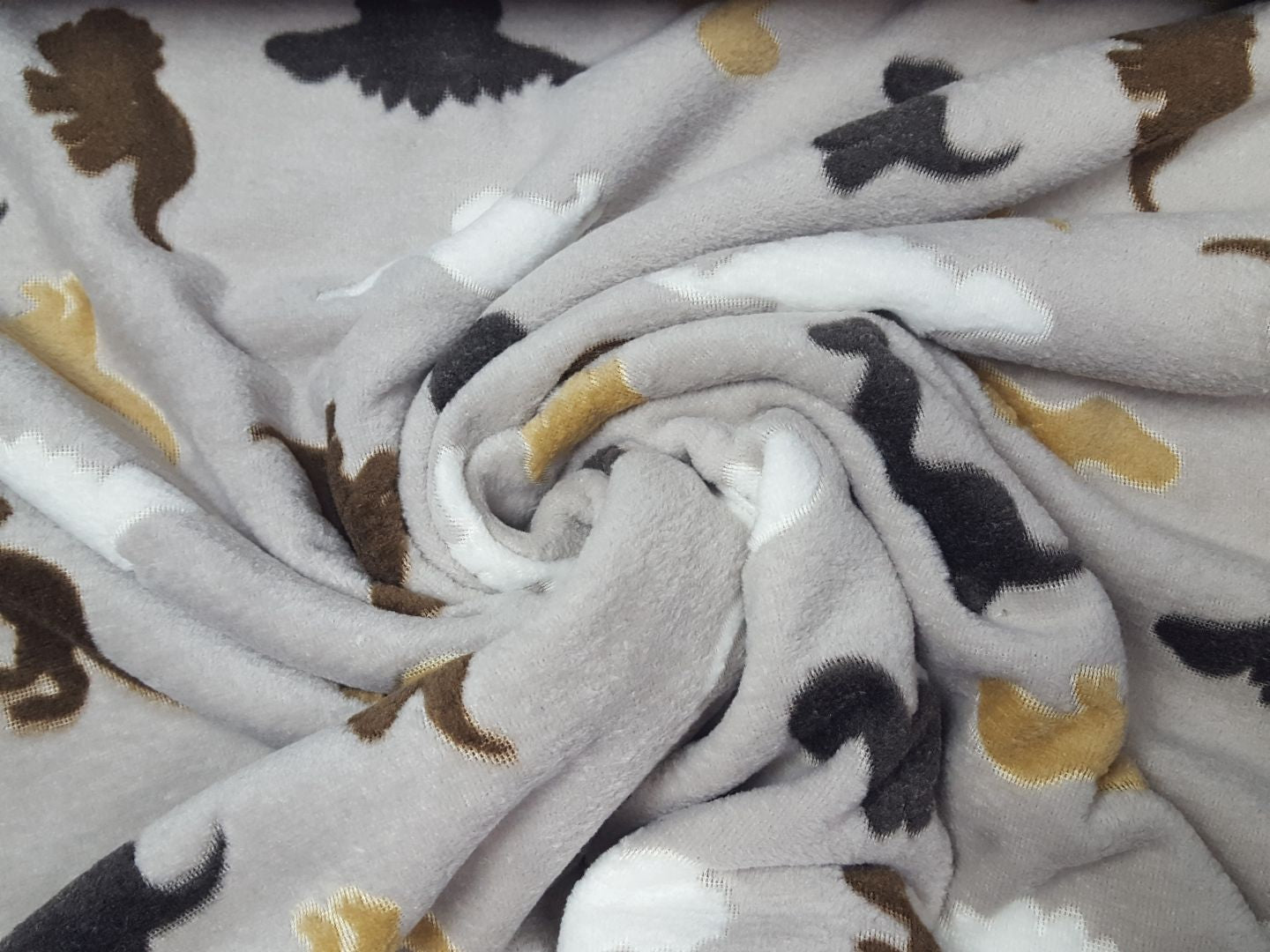 Wellnessfleece Dino sand/weiss/braun