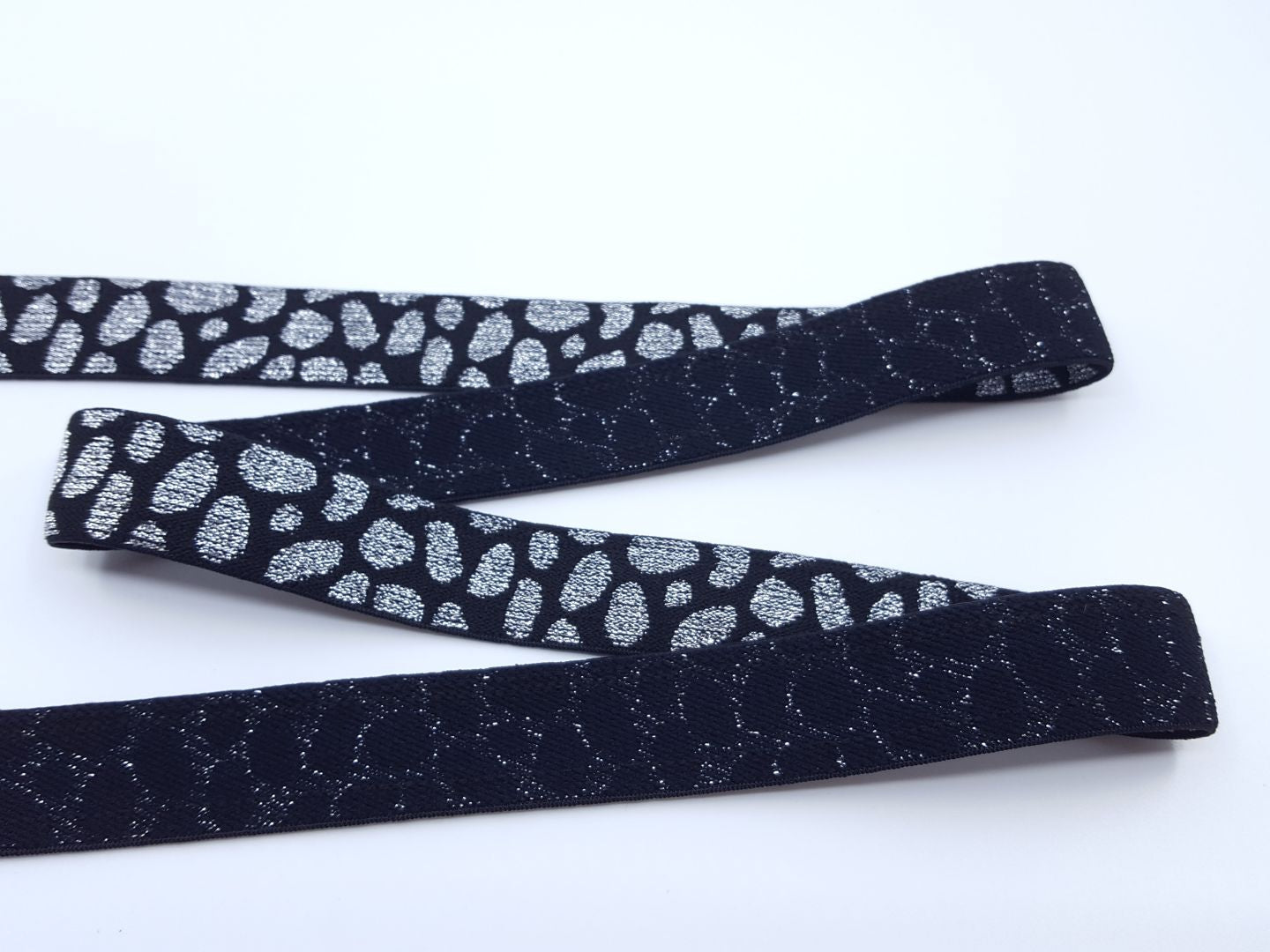 Elastisches Metall Gummiband Leo schwarz/silber