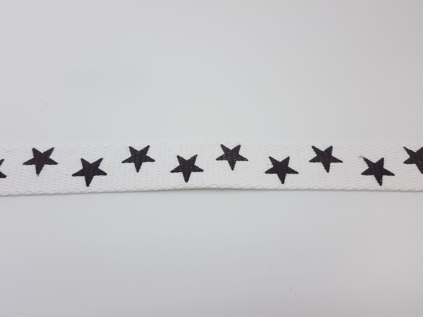 Gurtenband Stars 30mm weiss/schwarz