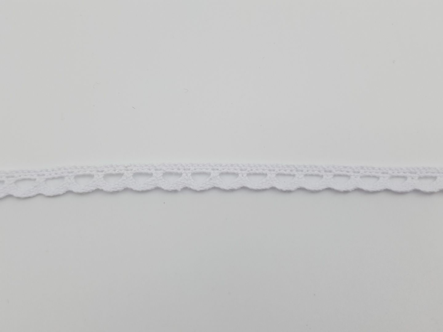 Klöppelspitze Wellen 7mm weiss