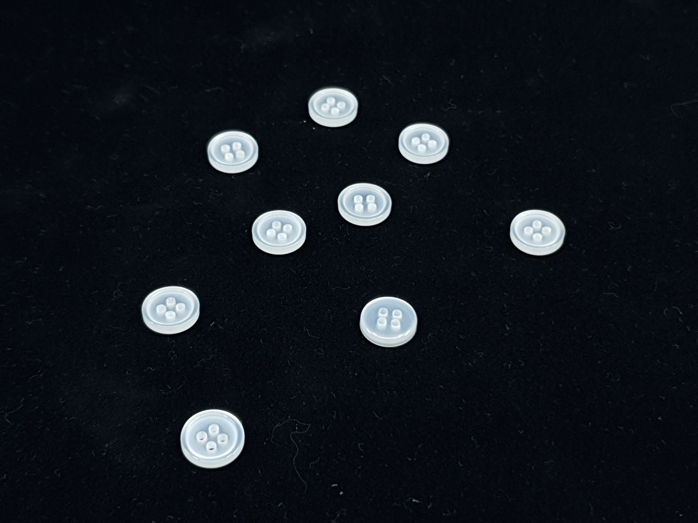 Kunstoffknöpfe mit Rand 10mm weiss
