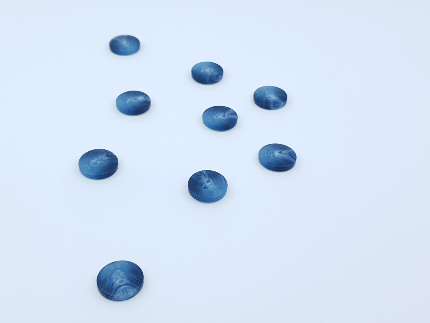 Kunststoffknöpfe 15mm blau/meliert