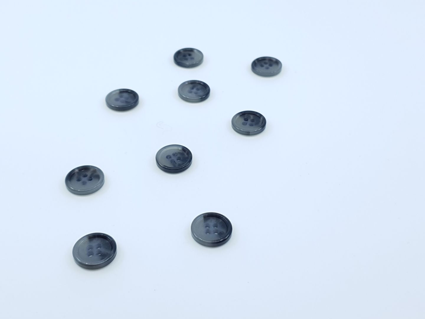 Kunststoffknöpfe 15mm hellgrau/schwarz