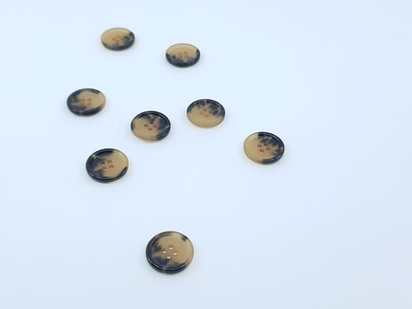 Kunststoffknöpfe 20mm hellbraun melange