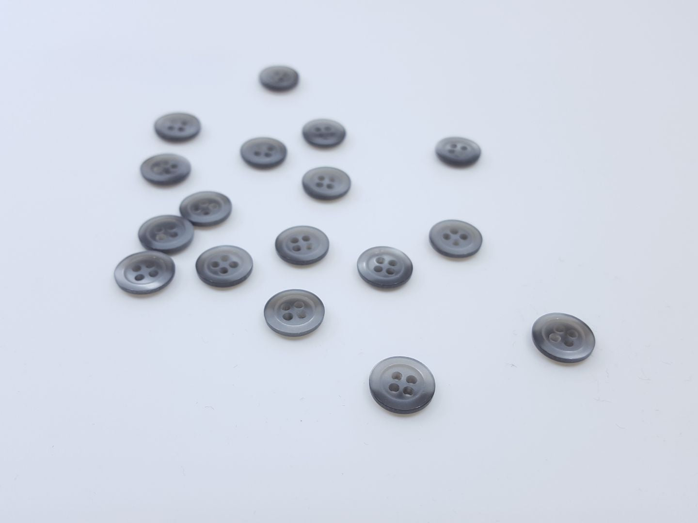 Kunststoffknöpfe mit Rand grau 12mm